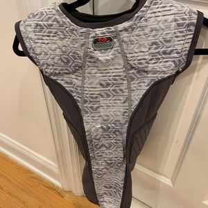 Sleeveless padded football shirt. Size large